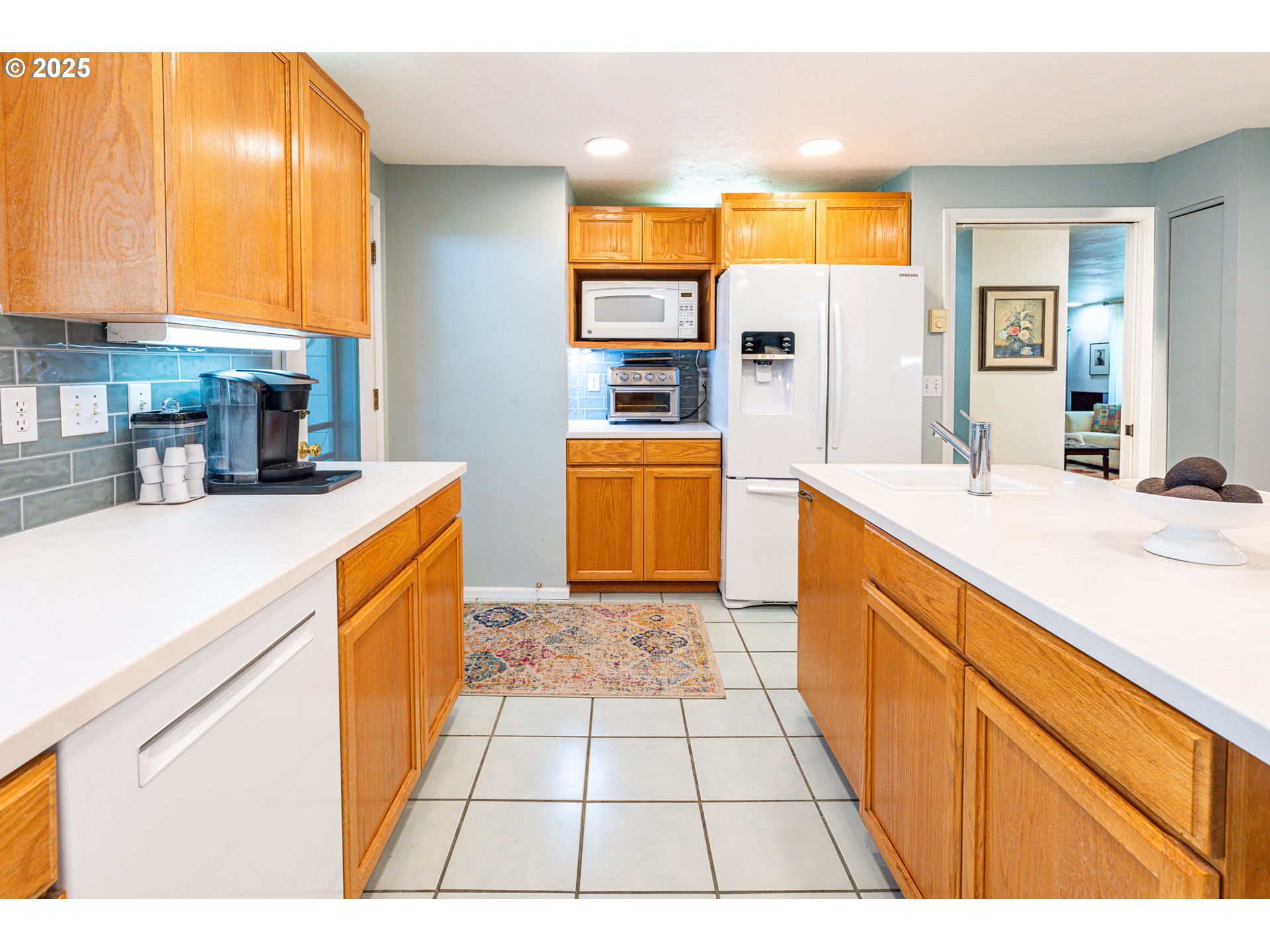 633 Rowan Avenue Springfield, OR 97477 - Photo 8 of 47 a kitchen with a sink a stove and cabinets