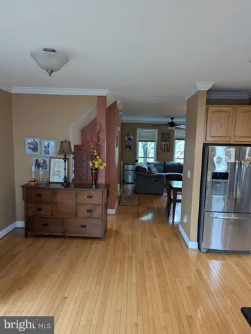 a room with furniture and wooden floor