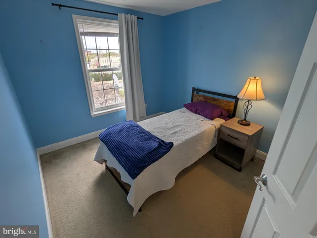 a bathroom with a toilet a sink and a shower
