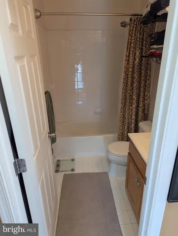 a bathroom with a toilet and a sink