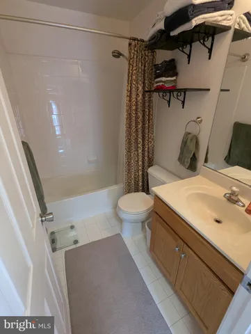 a bed room with a bed and a window