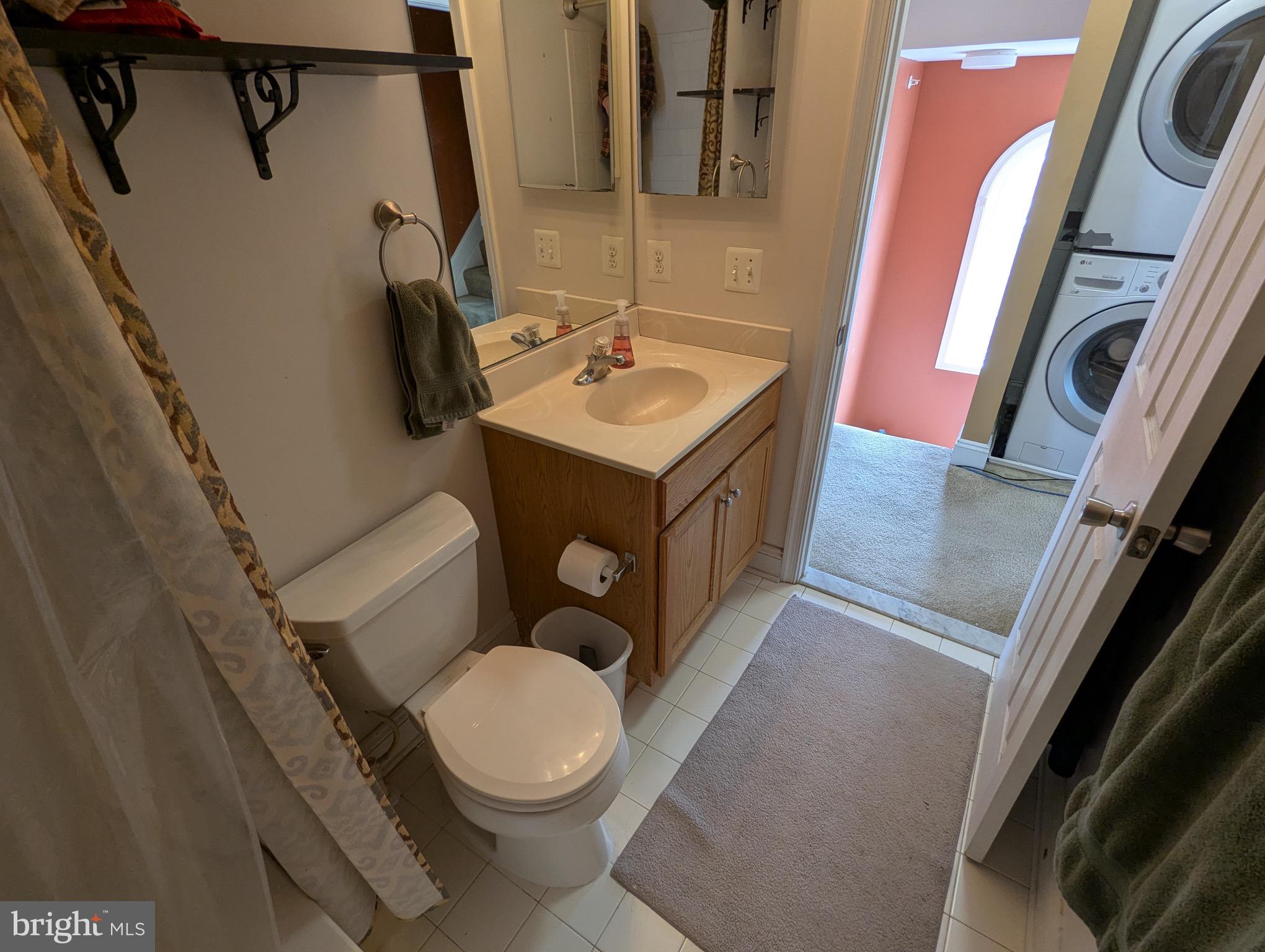 810 Ramsay Street Baltimore, MD 21230 - Photo 50 of 61 a white toilet sitting next to a bathroom sink