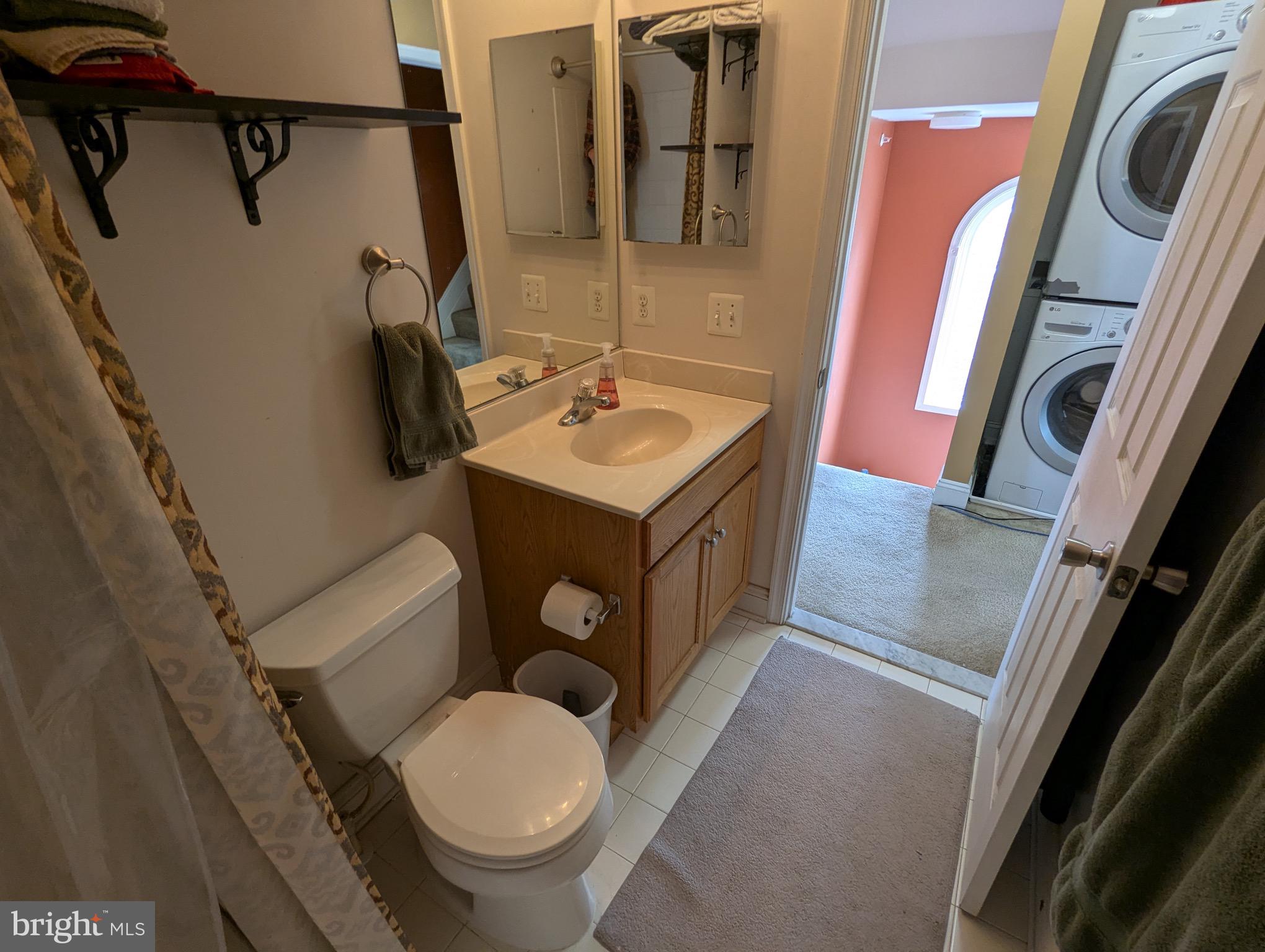 810 Ramsay Street Baltimore, MD 21230 - Photo 51 of 61 a bathroom with a sink a toilet a mirror and tub