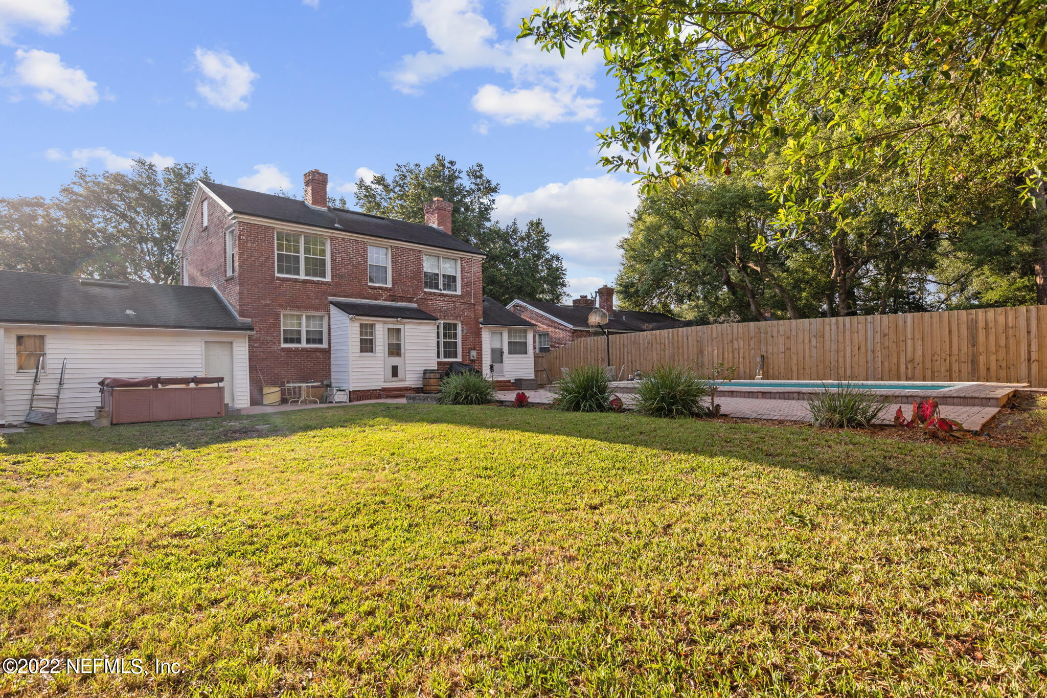 1408 Nicholson Road Jacksonville, FL 32207 - Photo 23 of 25 a view of a house with a yard