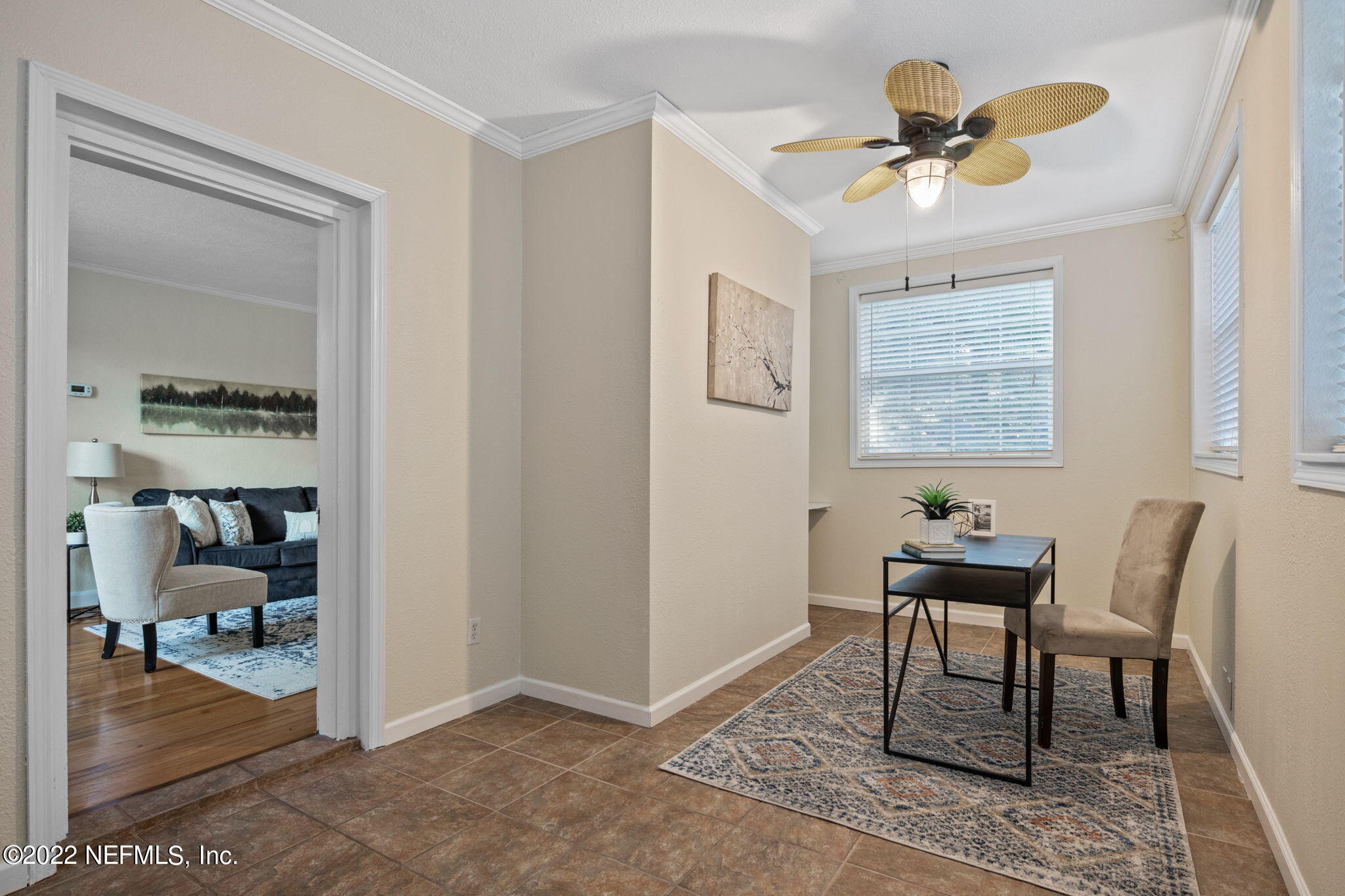 1408 Nicholson Road Jacksonville, FL 32207 - Photo 7 of 25 a workspace room with furniture and wooden floor