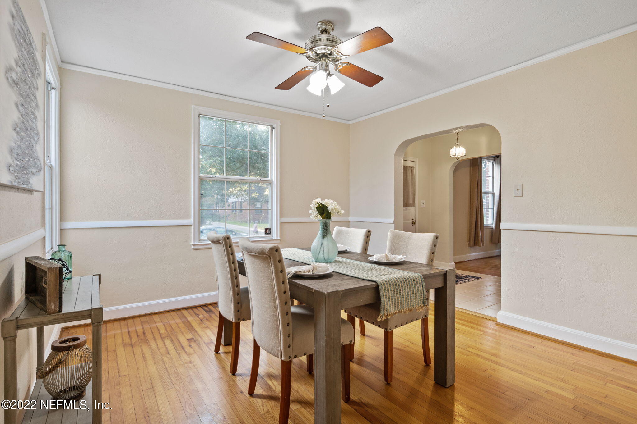 1408 Nicholson Road Jacksonville, FL 32207 - Photo 9 of 25 a view of a dining room with furniture and wooden floor