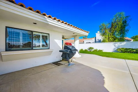 a house view with a garden space