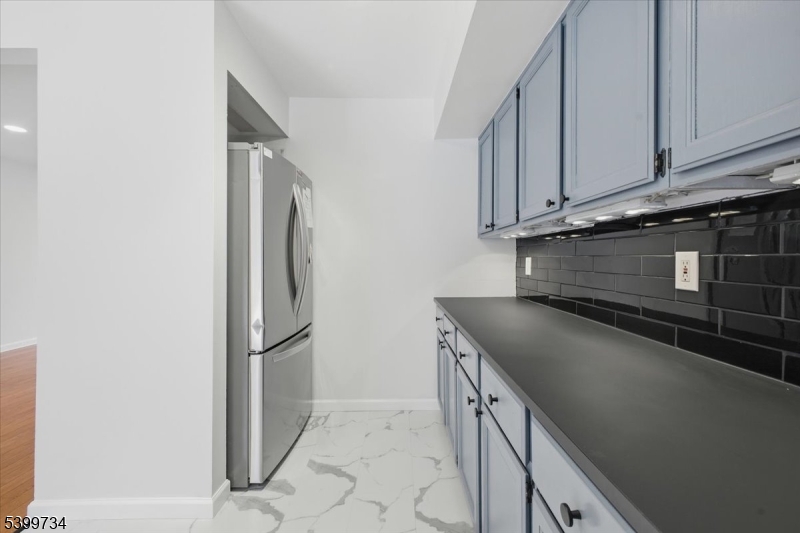103 Cheyenne Road Lafayette, NJ 07848 - Photo 11 of 27 a kitchen with stainless steel appliances granite countertop a refrigerator and a sink