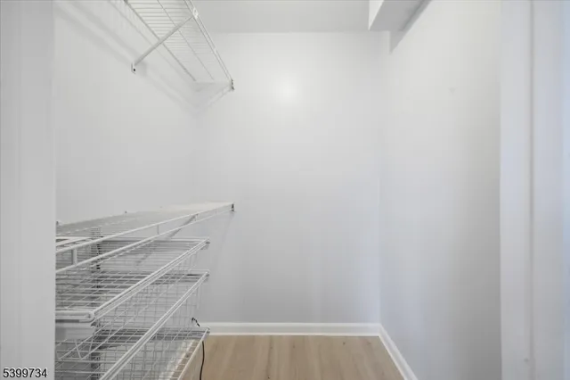 a view of a room with racks on the wall