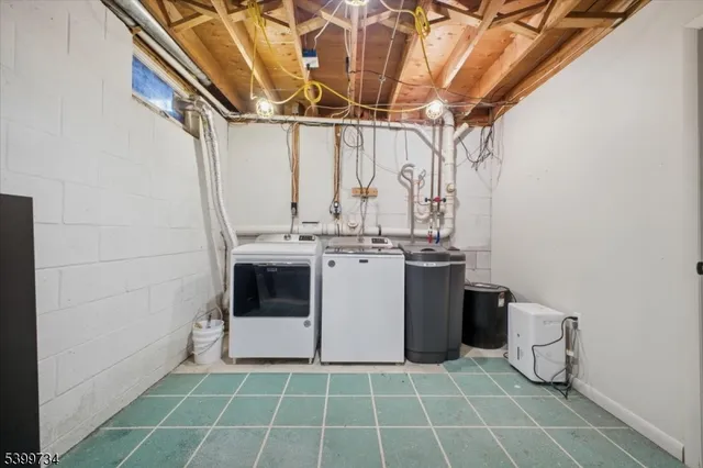 a utility room with a washer and dryer