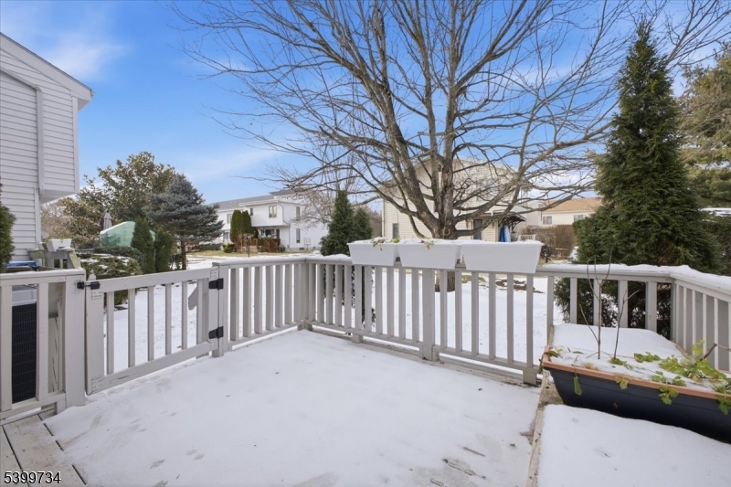 103 Cheyenne Road Lafayette, NJ 07848 - Photo 25 of 27 a view of a wooden deck and a backyard