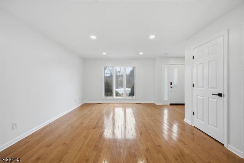 103 Cheyenne Road Lafayette, NJ 07848 - Photo 4 of 27 a view of an empty room and wooden floor
