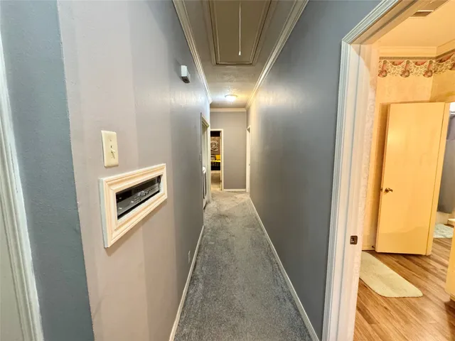 a view of hallway with stairs