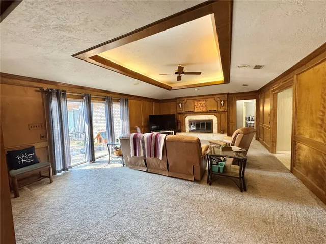 a bed room with furniture and a window