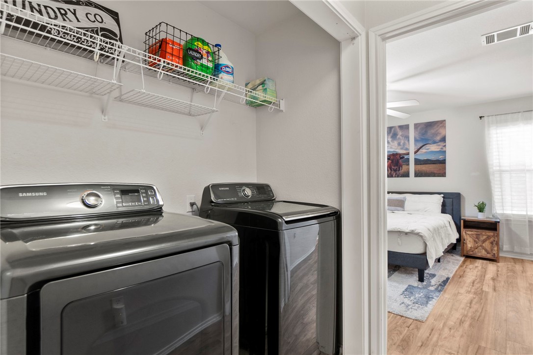 5908 Silver Screen Drive Austin, TX 78747 - Photo 22 of 24 a utility room with dryer and washer