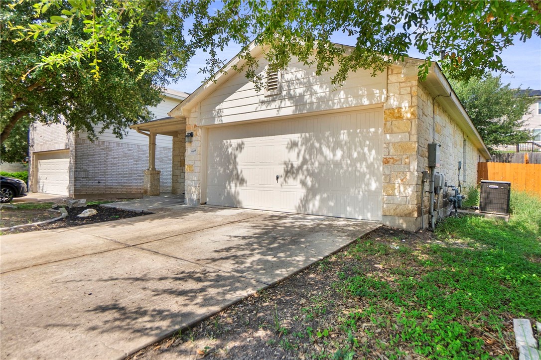 5908 Silver Screen Drive Austin, TX 78747 - Photo 6 of 24 a view of a house with a tree in front