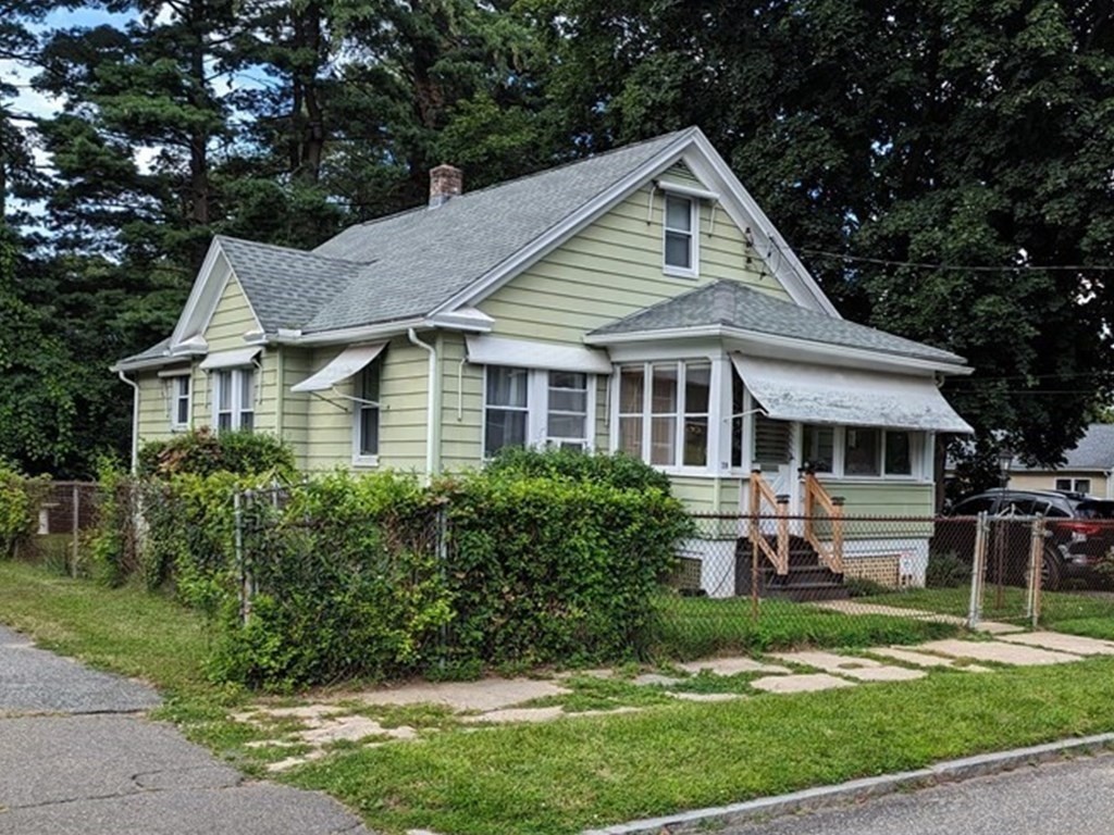 28 Bushwick Place Springfield, MA 01109 - Photo 1 of 24 a front view of a house with a yard