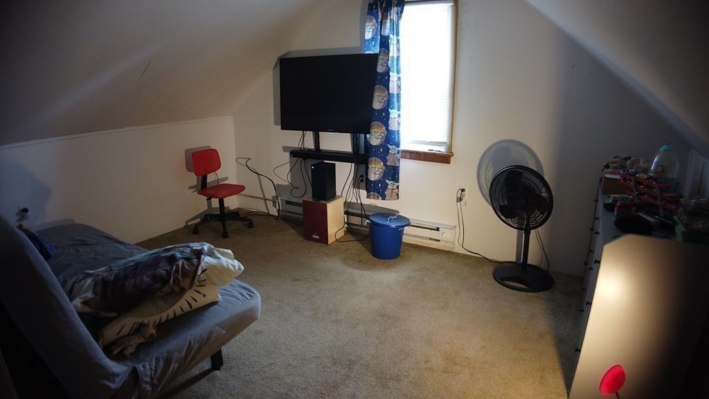28 Bushwick Place Springfield, MA 01109 - Photo 12 of 24 a living room with furniture and a window
