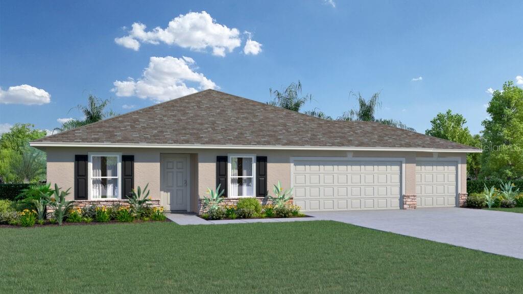2230 Pomeroy Road Spring Hill, FL 34609 - Photo 1 of 2 a front view of a house with a yard