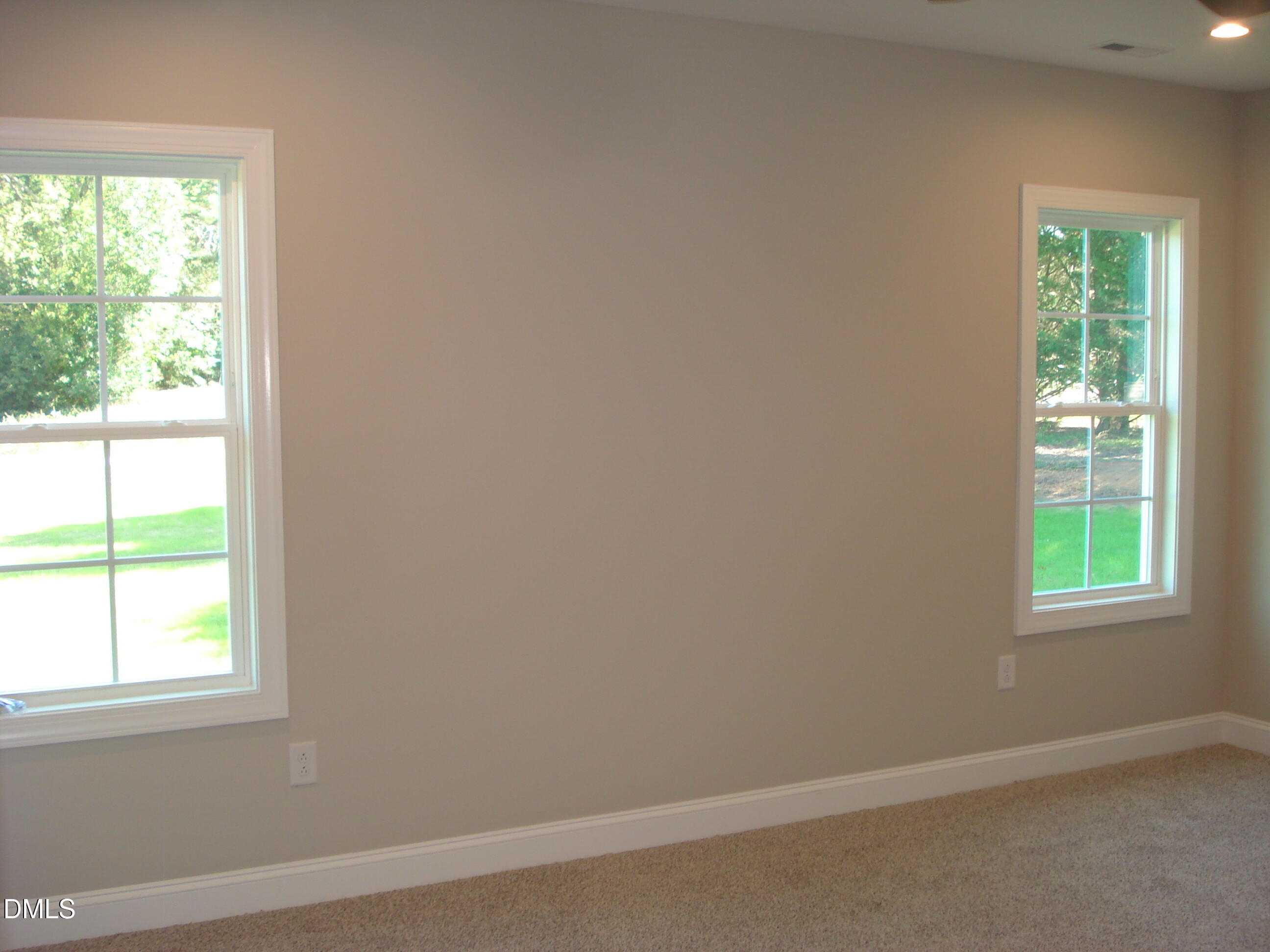 93 Big J Street Erwin, NC 28339 - Photo 34 of 56 an empty room with a window
