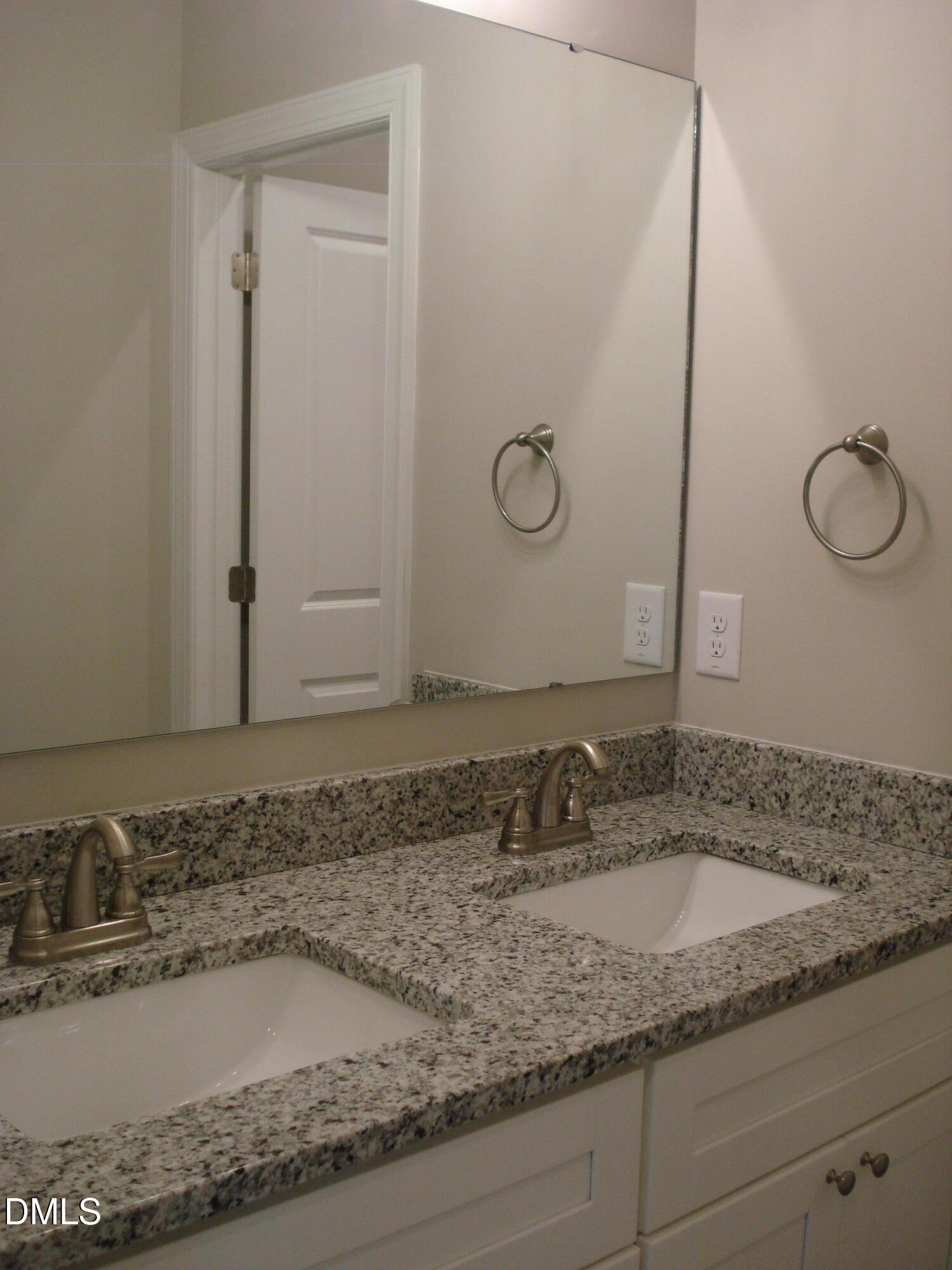 93 Big J Street Erwin, NC 28339 - Photo 46 of 56 a bathroom with a granite countertop sink and a mirror