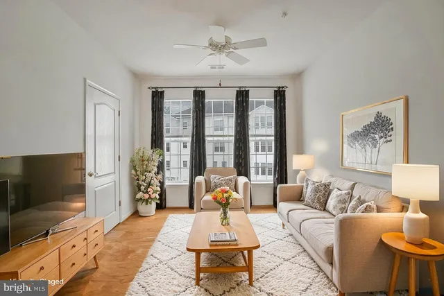 a kitchen with stainless steel appliances granite countertop a refrigerator sink and stove