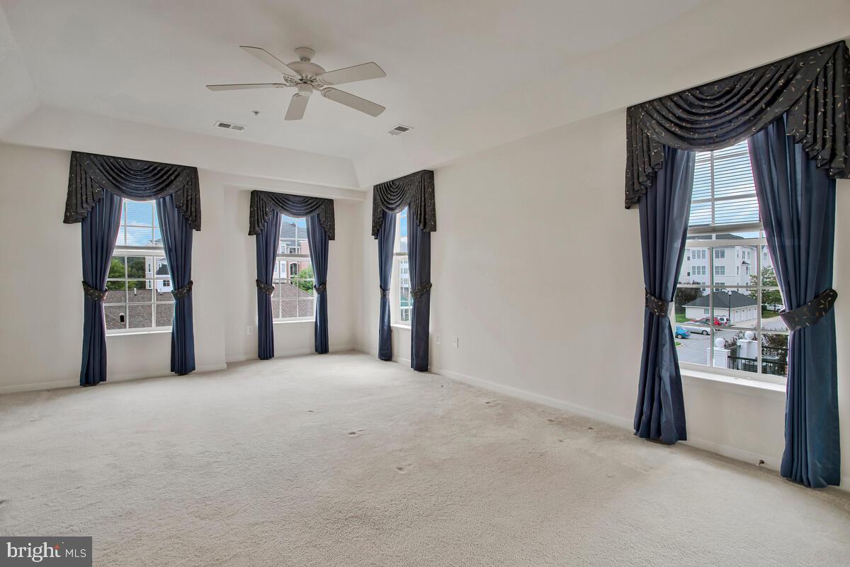 7315 Brookview Road, Unit 302 Elkridge, MD 21075 - Photo 27 of 68 a view of an empty room with a window