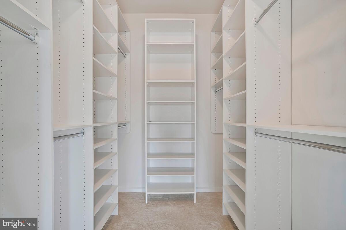 7315 Brookview Road, Unit 302 Elkridge, MD 21075 - Photo 31 of 68 a view of walk in closet with empty racks