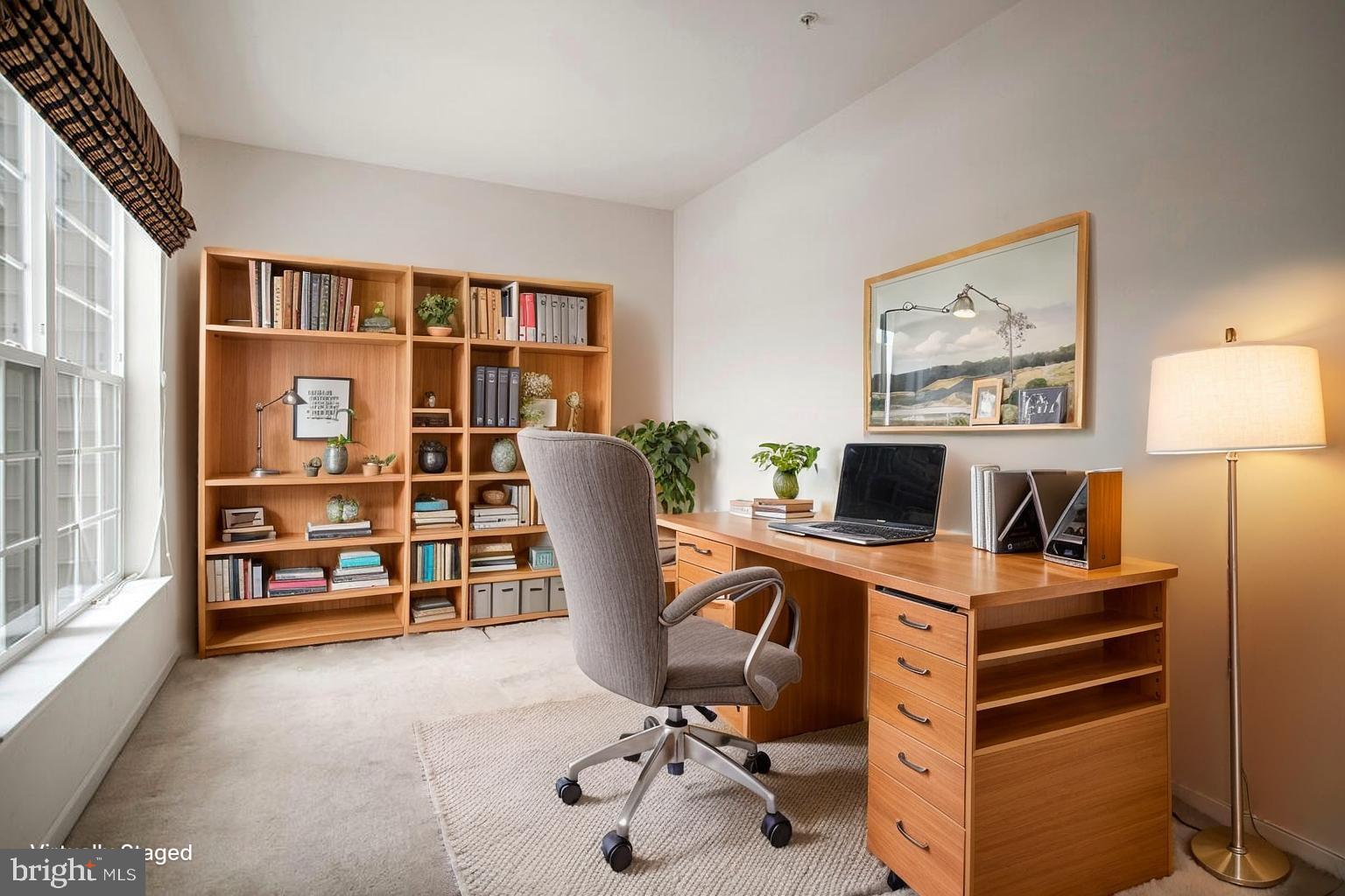 7315 Brookview Road, Unit 302 Elkridge, MD 21075 - Photo 36 of 68 a view of a workspace with furniture and a window