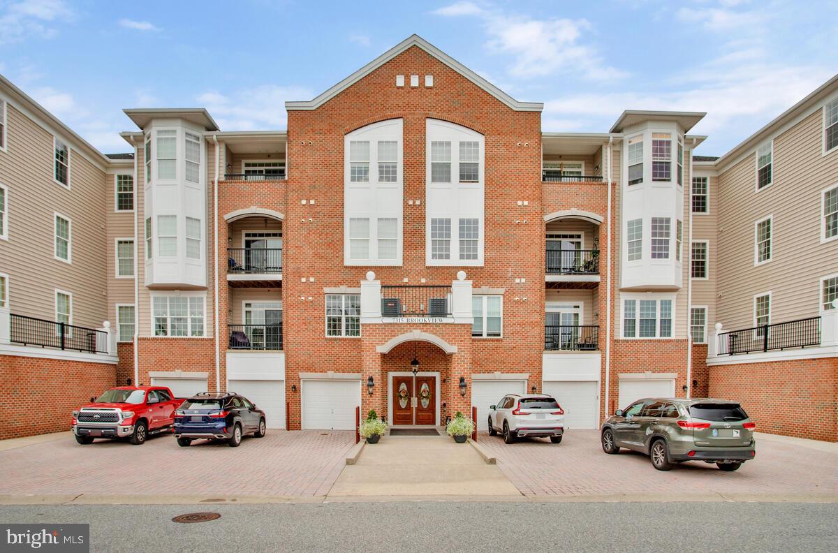 7315 Brookview Road, Unit 302 Elkridge, MD 21075 - Photo 3 of 68 a car parked in front of a building