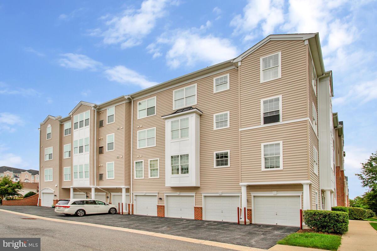 7315 Brookview Road, Unit 302 Elkridge, MD 21075 - Photo 40 of 68 a front view of a building with a street