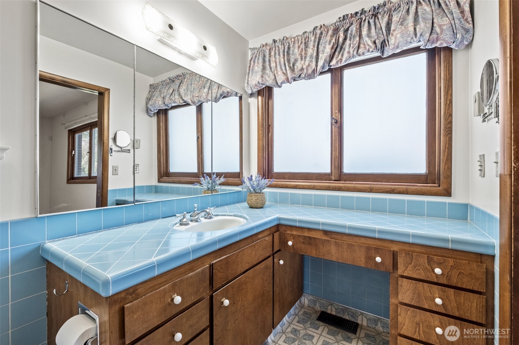 742 I Street Southwest Quincy, WA 98848 - Photo 14 of 28 a bathroom with a sink double vanity and a mirror