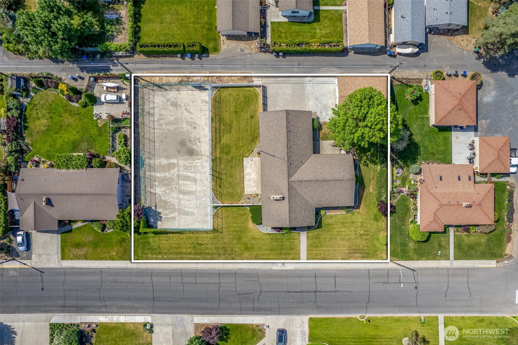 742 I Street Southwest Quincy, WA 98848 - Photo 2 of 28 an aerial view of a house with swimming pool