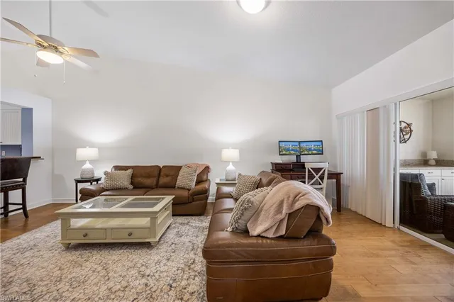 a living room with furniture and a couch