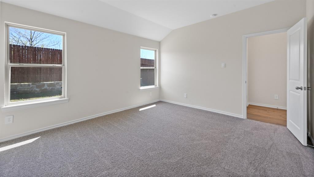 210 Pheasant Run Road Terrell, TX 75160 - Photo 14 of 28 a view of an empty room with a window
