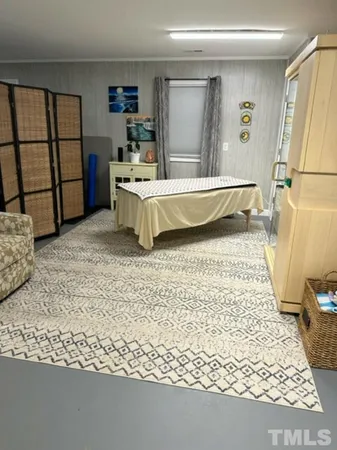 a living room with a couch and a table