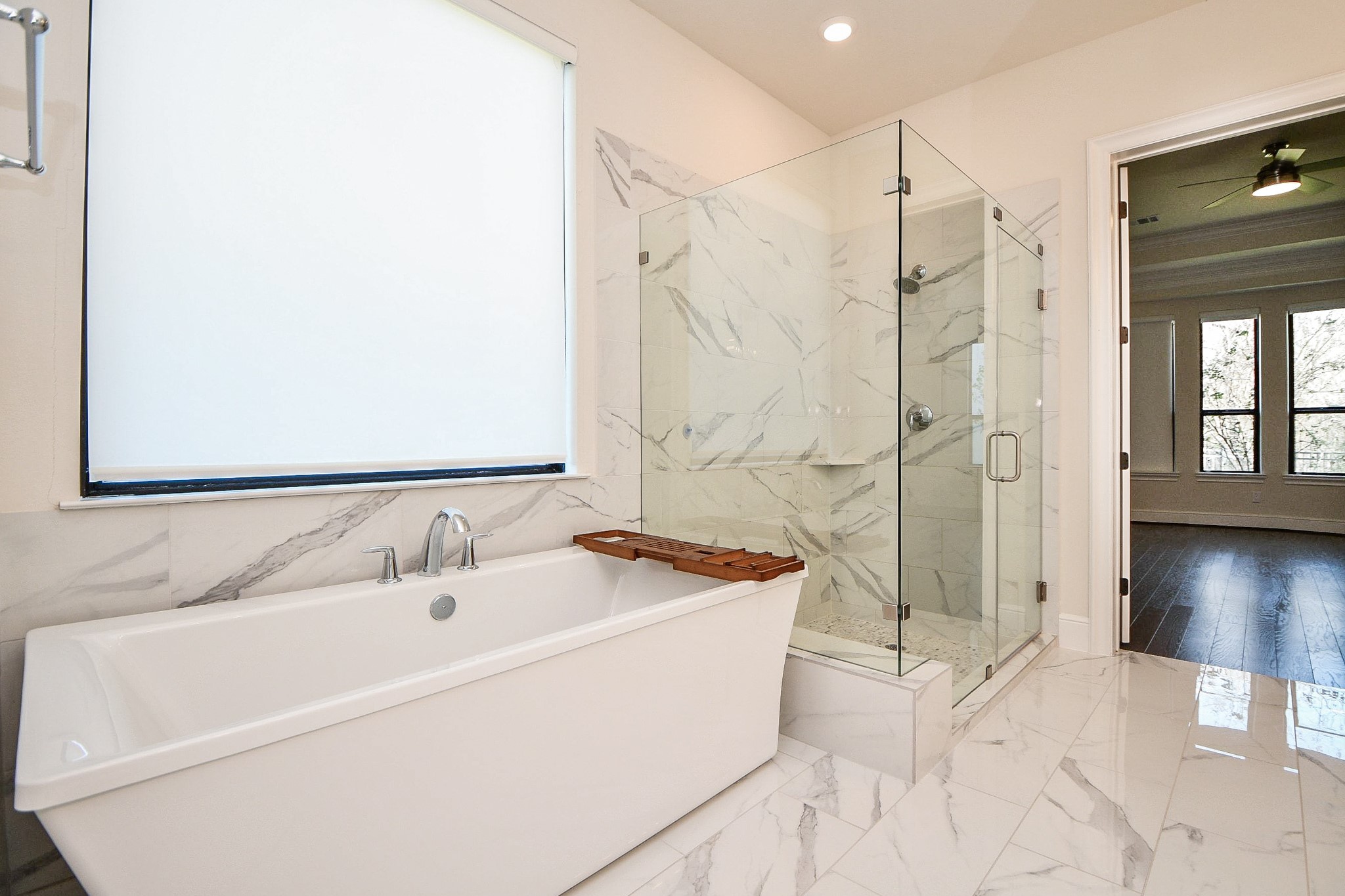 8526 Tombron Grove Road Magnolia, TX 77354 - Photo 20 of 50 a bathroom with a sink a toilet and shower