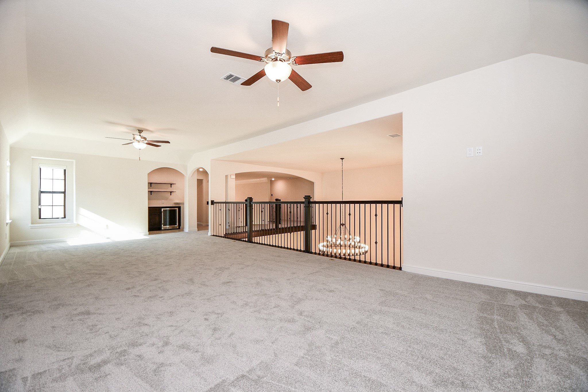 8526 Tombron Grove Road Magnolia, TX 77354 - Photo 23 of 50 an empty room with ceiling fan and windows