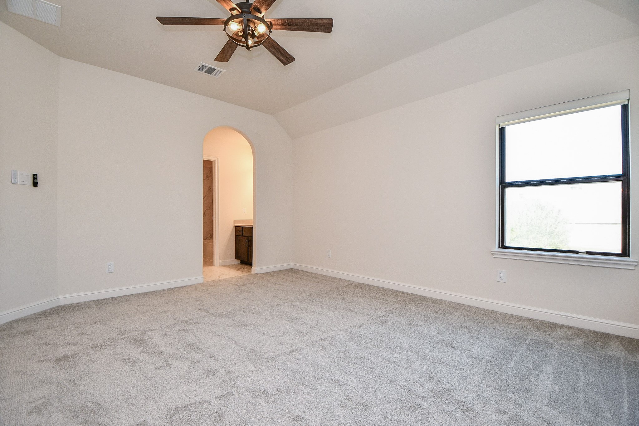 8526 Tombron Grove Road Magnolia, TX 77354 - Photo 30 of 50 an empty room with a window and a ceiling fan