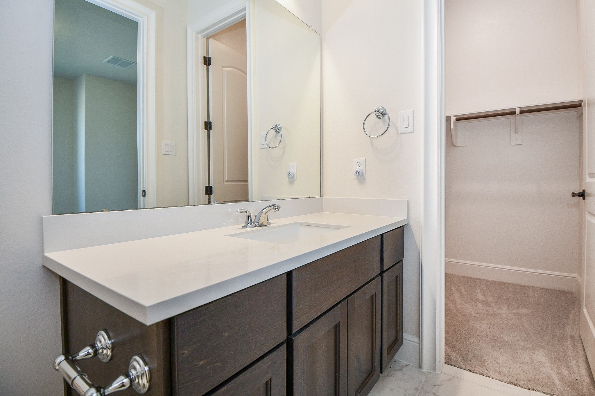 8526 Tombron Grove Road Magnolia, TX 77354 - Photo 39 of 50 a bathroom with a sink and a mirror