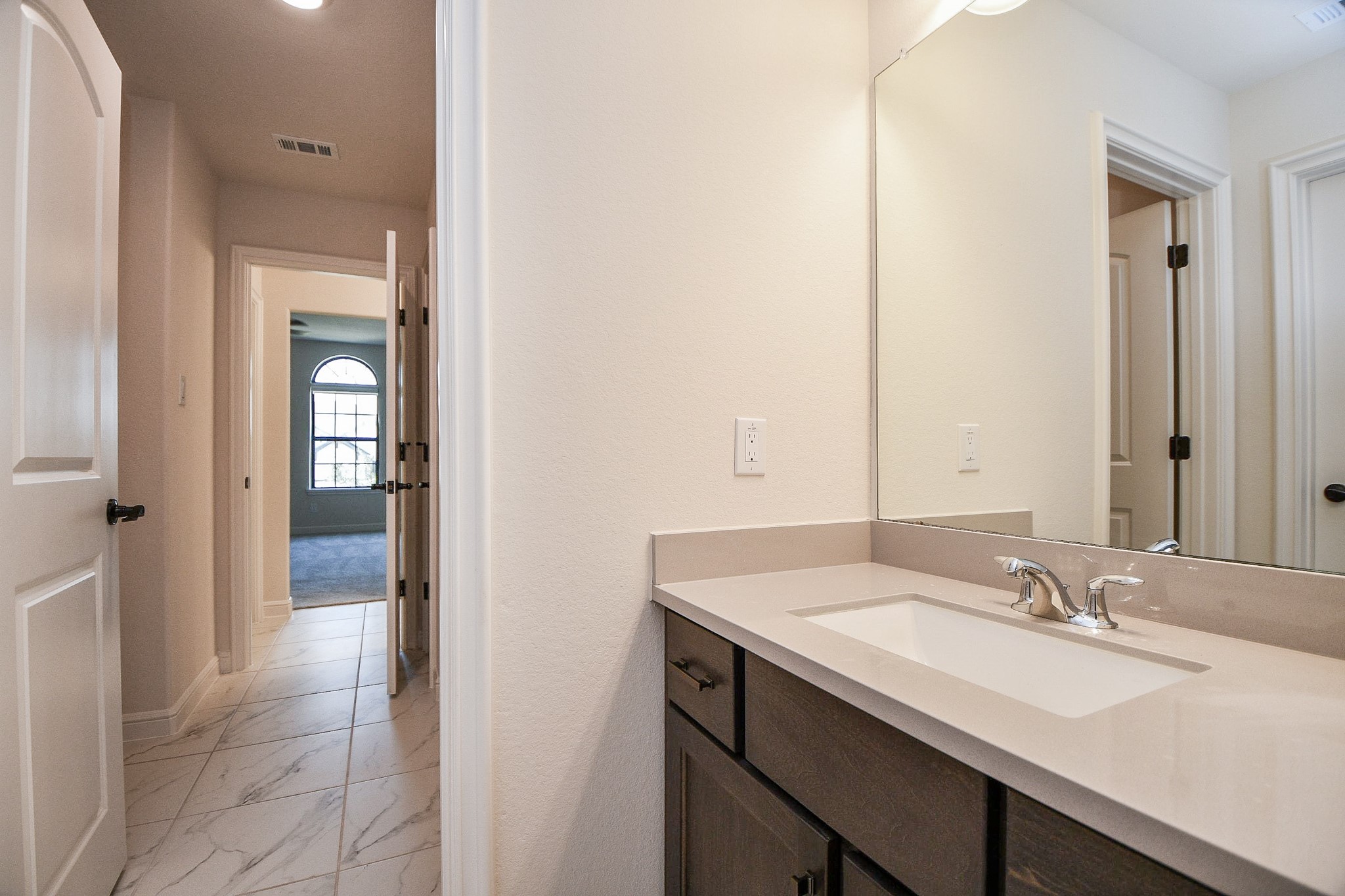 8526 Tombron Grove Road Magnolia, TX 77354 - Photo 42 of 50 a bathroom with a sink and a mirror