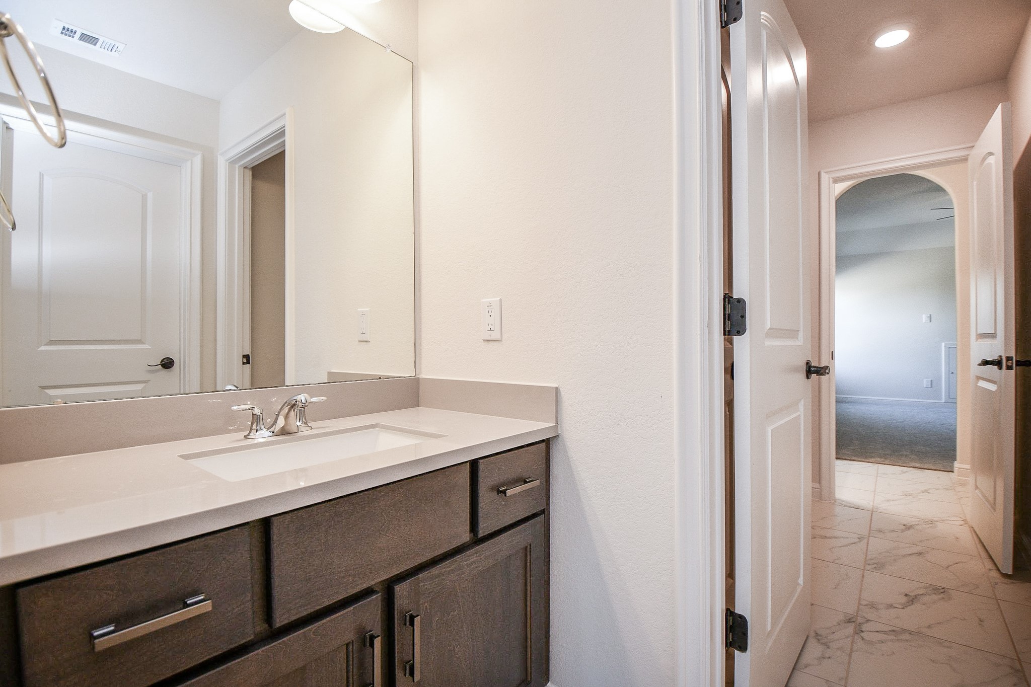 8526 Tombron Grove Road Magnolia, TX 77354 - Photo 44 of 50 a bathroom with a sink and a mirror