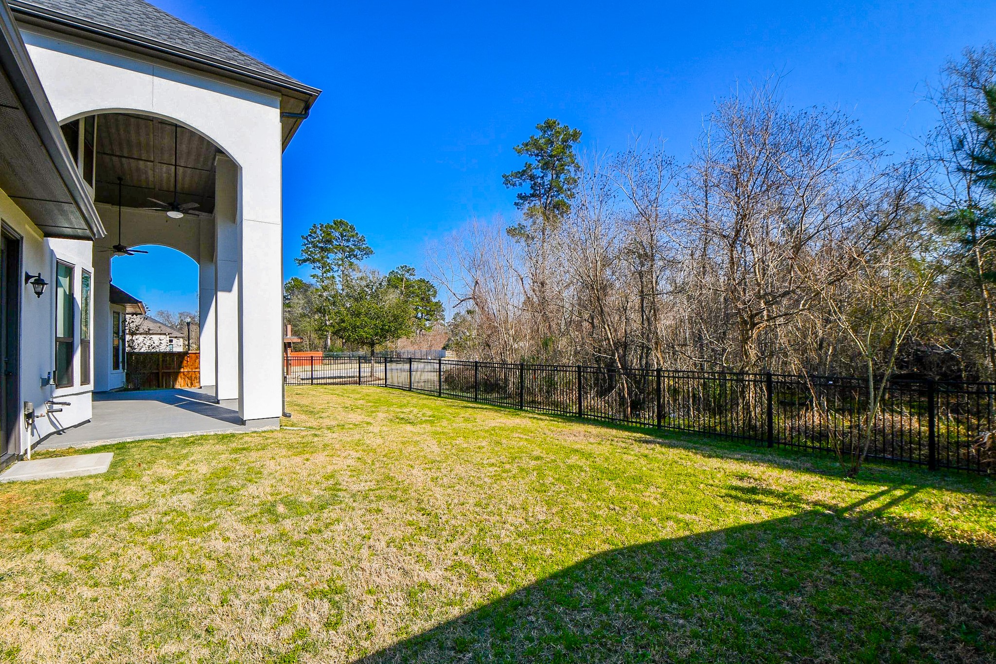 8526 Tombron Grove Road Magnolia, TX 77354 - Photo 48 of 50 a view of a house with backyard and tree