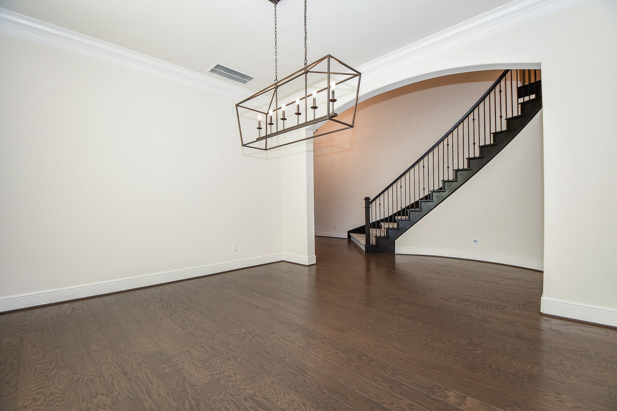 8526 Tombron Grove Road Magnolia, TX 77354 - Photo 6 of 50 a view of a room with wooden floor and stairs