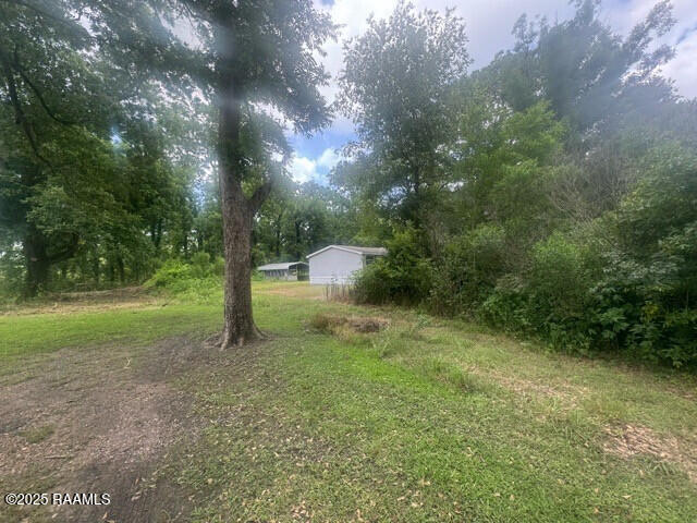 1042 Lucette Guidry Road Breaux Bridge, LA 70517 - Photo 5 of 19 IMG_3120