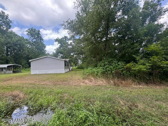1042 Lucette Guidry Road Breaux Bridge, LA 70517 - Photo 7 of 19 IMG_3123