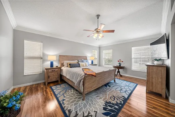 a bedroom with bed and window