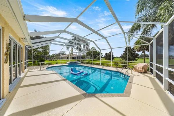 a view of a house with swimming pool