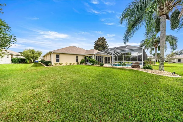 a view of a house with a big yard
