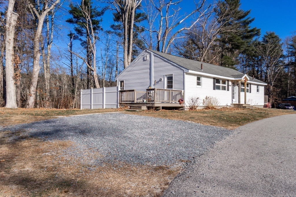 65 Depot Road, Unit A Oxford, MA 01540 - Photo 13 of 17 a view of a house with a snow on the road
